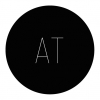 AT